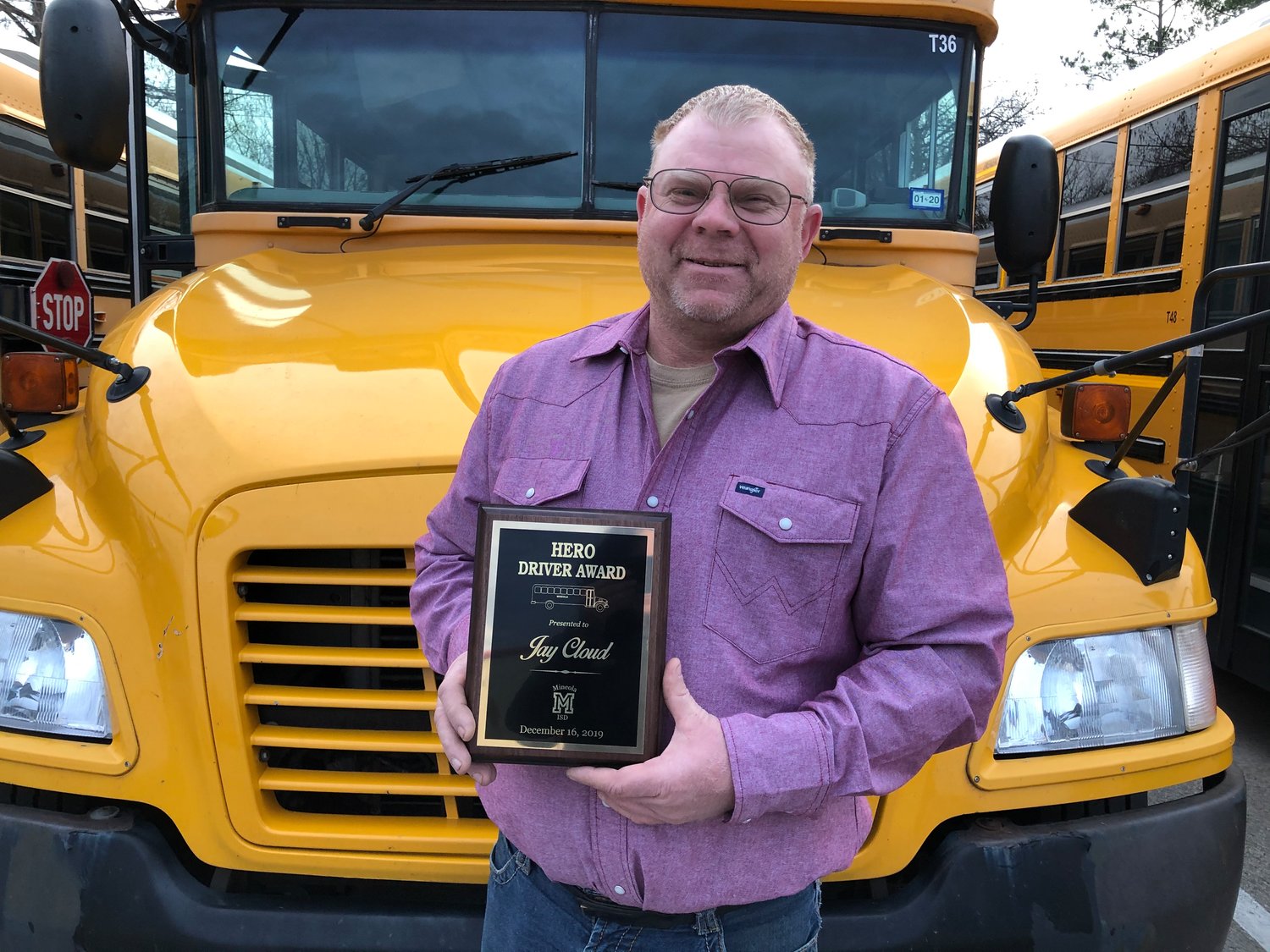 Mineola bus driver Jay Cloud was presented the Hero Driver Award last week by the MISD school board. (Monitor photo by Amanda Duncan)